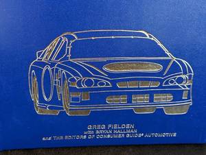 lot 57 image: NASCAR the Complete History by Greg Fielden