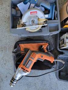 lot 73 image: Corded Power Tool Bundle