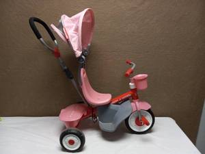 lot 59 image: RADIO FLYER 4 IN 1 STROLL N TRIKE