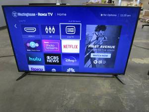 lot 922 image: Westinghouse 50 4K Ultra HD Smart Roku TV with HDR WR50UT4212