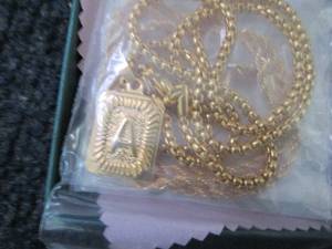 lot 243 image: Ursteel Gold Initial Necklace for M...