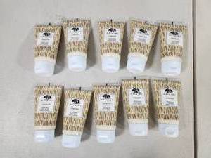 lot 168 image: 10 New Origins Ginger Hand Lotions