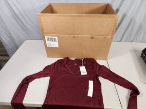 lot 180 image: Case of 48 New Full Length Long Sleeve Vneck Tops