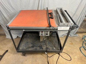 lot 13 image: Shrink Wrapping Cart (missing wheel)