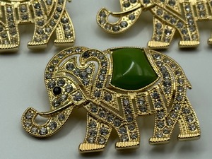 lot 159 image: Fun Rhinestone Gold Tone Jewelry Items including Three Monet Elephant Brooches