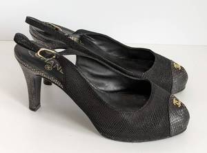 lot 55 image: Chanel CC Cap Toe Platform Slingback Pumps