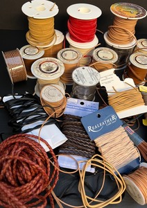 lot 310 image: Leather and Metallic Cording