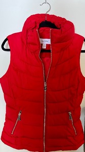 lot 120 image: Red Calvin Klein and Black Bebe Vests