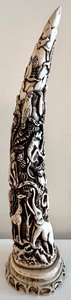 lot 128 image: Faux Ivory Carved Tusk Art with Emblazon Of Knife