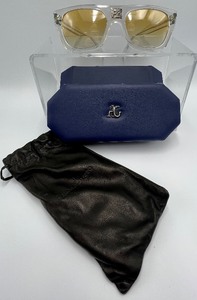 lot 48 image: Angelo Galasso Designer mens sunglasses and The Player International Bookazine for men