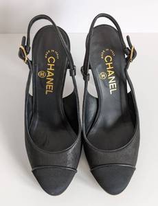 lot 62 image: Chanel Cap Toe Slingback Pumps