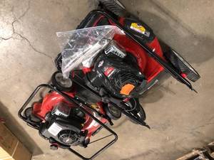 lot 42 image: Troy-Bilt  21in. 140cc Briggs & Stratton Gas Push Lawn Mower Lot of 2 Customer return Review all pictures