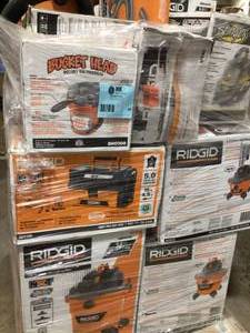 Pallet of assorted Ridgid wetdry Vacuums various models and conditions Customer return review photos