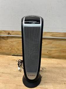 lot 34 image: LASKO 1500-Watt 23 in. Electric Oscillating Ceramic Tower Space Heater with Timer