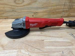 lot 107 image: MILWAUKEE 11 Amp Corded 4-12 in. Small Angle Grinder with Lock-On Paddle Switch