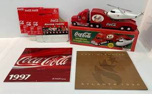 lot 27 image: 2000 Coca-Cola Holiday Helicopter Carrier NIB & Coca-Cola Calendars And More