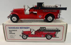lot 30 image: Vintage Madan Refinery Seagrave Fire Engine Coin Bank 130 Scale Die-Cast
