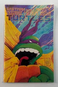lot 33 image: 1989 Eastman And Lairds Teenage Mutant Ninja Turtles Comic Book (Carded In Protective Sleeve)