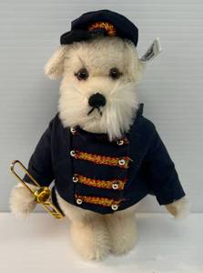 lot 84 image: Steiff Circus Dog Bandsman By Steiff