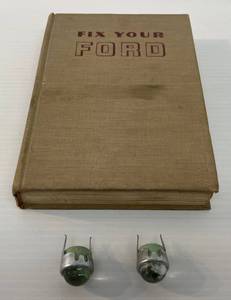 lot 145 image: 1972 Fix Your Ford Repair Book And Vintage Auto Lenses