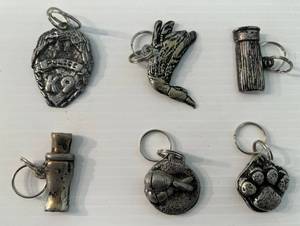 lot 158 image: Unique Pewter Dog Tags