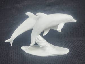 lot 62 image: Kaiser Porcelain White Dolphins Figurine, Style 509