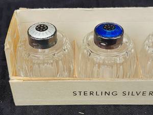 lot 106 image: Sterling Silver Guilloche Enamel Capped Salt and Pepper Shakers