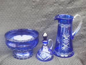 lot 114 image: Bohemian Cobalt Blue Cut to Clear Crystal Pitcher, Centerpiece Bowl & Cruet