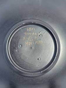 lot 69C image: Zward Holland Hand Painted Plate  Matte Black with Red, Blue & Yellow Accents