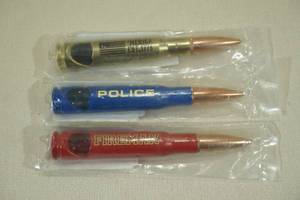 lot 51 image: Lucky Shot 50 Cal BMG Bottle Openers - Merica, Police, Fireman