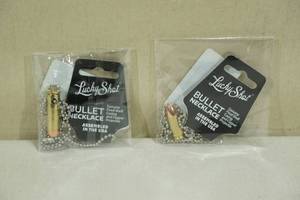 lot 55 image: Lucky Shot Bullet Necklaces