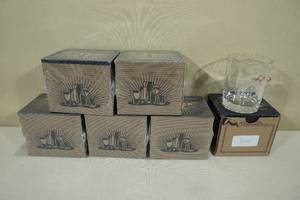 lot 141 image: Whiskey Glasses with Embedded Bullets - Protected by the Lord and a Gun