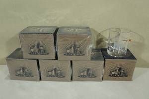 lot 155 image: Whiskey Glasses with Embedded Bullets - Land of the Free Home of the Brave Flag