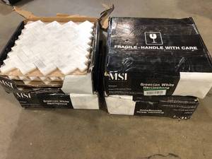 MSI  Greecian White Herringbone Pattern 12 in. x 12 in. x 10 mm Polished Marble Mosaic Tile (9.4 sq. ft.  case) 14 cases Customer returns Review all pictures