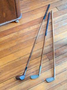 lot 71 image: Three Antique Golf Clubs