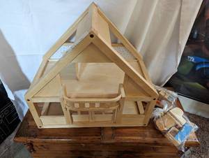 lot 137 image: Plan Toys Wood Doll House with Furniture