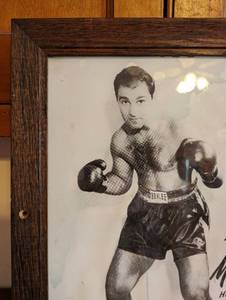 lot 213 image: Framed Rocky Marciano Photo
