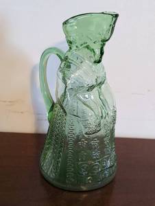 lot 256 image: Uranium Glass Colonial Woman Toby Syrup Pitcher
