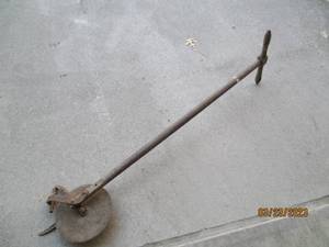 lot 277 image: Antique wood and Metal lawn edger...