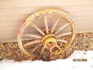 lot 33 image: Antique yellow metal and wooden wag...