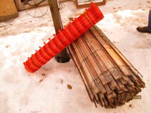lot 47 image: Pair of wood and plastic snow fenci...