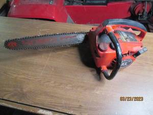 lot 94 image: Homelite gas chainsaw...