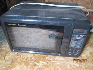 lot 99 image: Sharp digital Countertop Microwave...