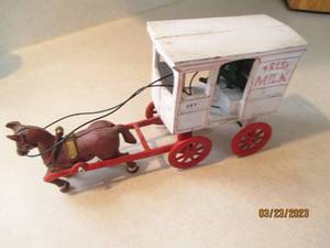 lot 187 image: Antique Cast Iron Oak Grove Dairy H...