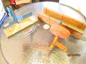 lot 214 image: Vintage Miter boxes and drain snake...