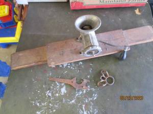 lot 241 image: Antique Meat Grinder mounted on a w...
