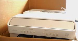 lot 95 image: Midea 8,000 BTU U-Shaped Smart Inverter Window Air Conditioner