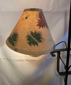 lot 66 image: Metal Adjustable Height Electric Floor Lamp with Leaf Themed Shade