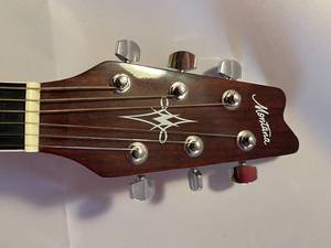 lot 73 image: Hand Crafted Montana Guitar Model MT105-CR