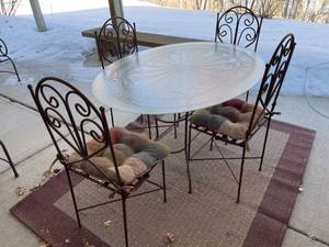 lot 79 image: Ornate Metal Glass Patio Table with 4 Chairs and Pads